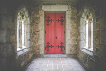 red door in a medieval building